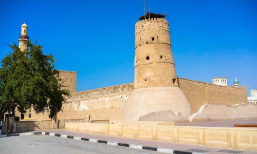 Old Dubai of buildings and traditional Arabian streets. Historical Al Fahidi neighborhood, Al Bastakiya in Dubai.